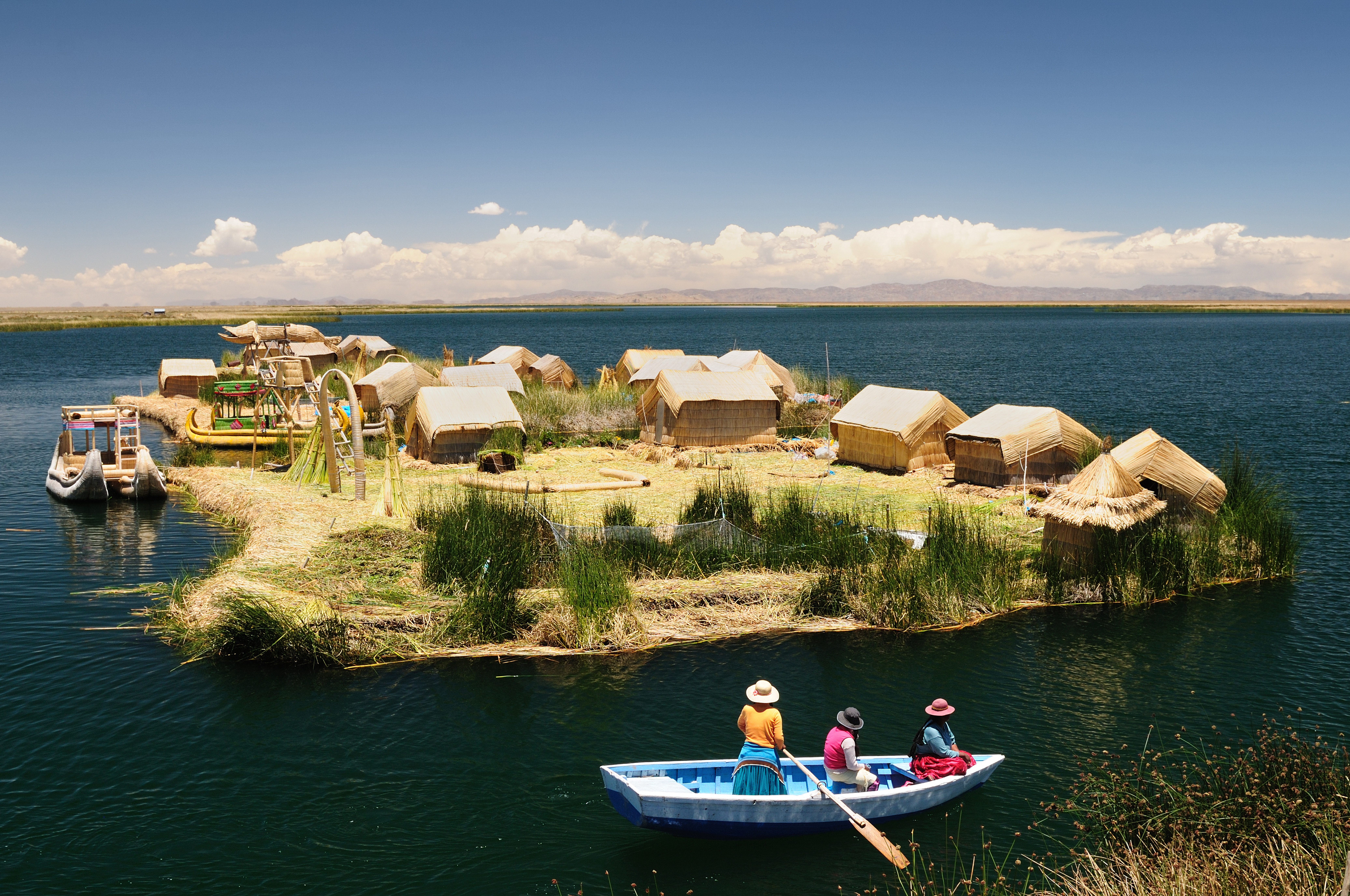 floating Uros islands on the Titicaca lake, the largest highaltitude lake in the world (3808m). Theyre built using the buoyant totora reeds_96802072